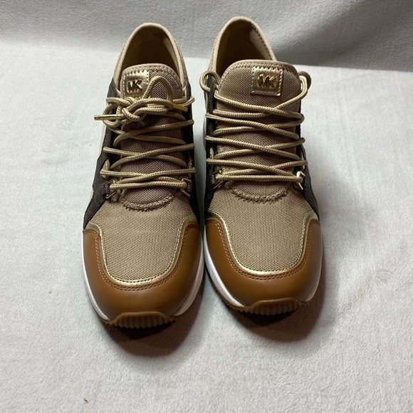 MICHAEL Michael Kors Shoes - Michael Kors brown animal print wedged sneakers size 8.5